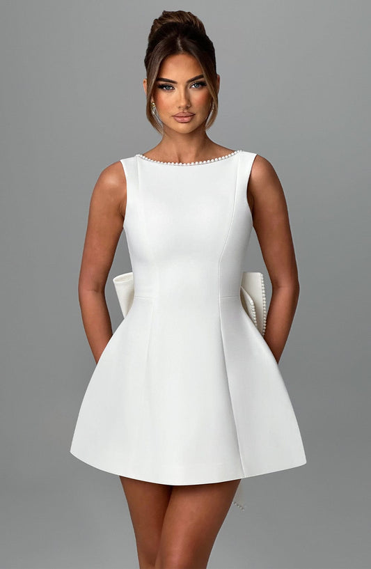 Elodie – Bow back mini dress